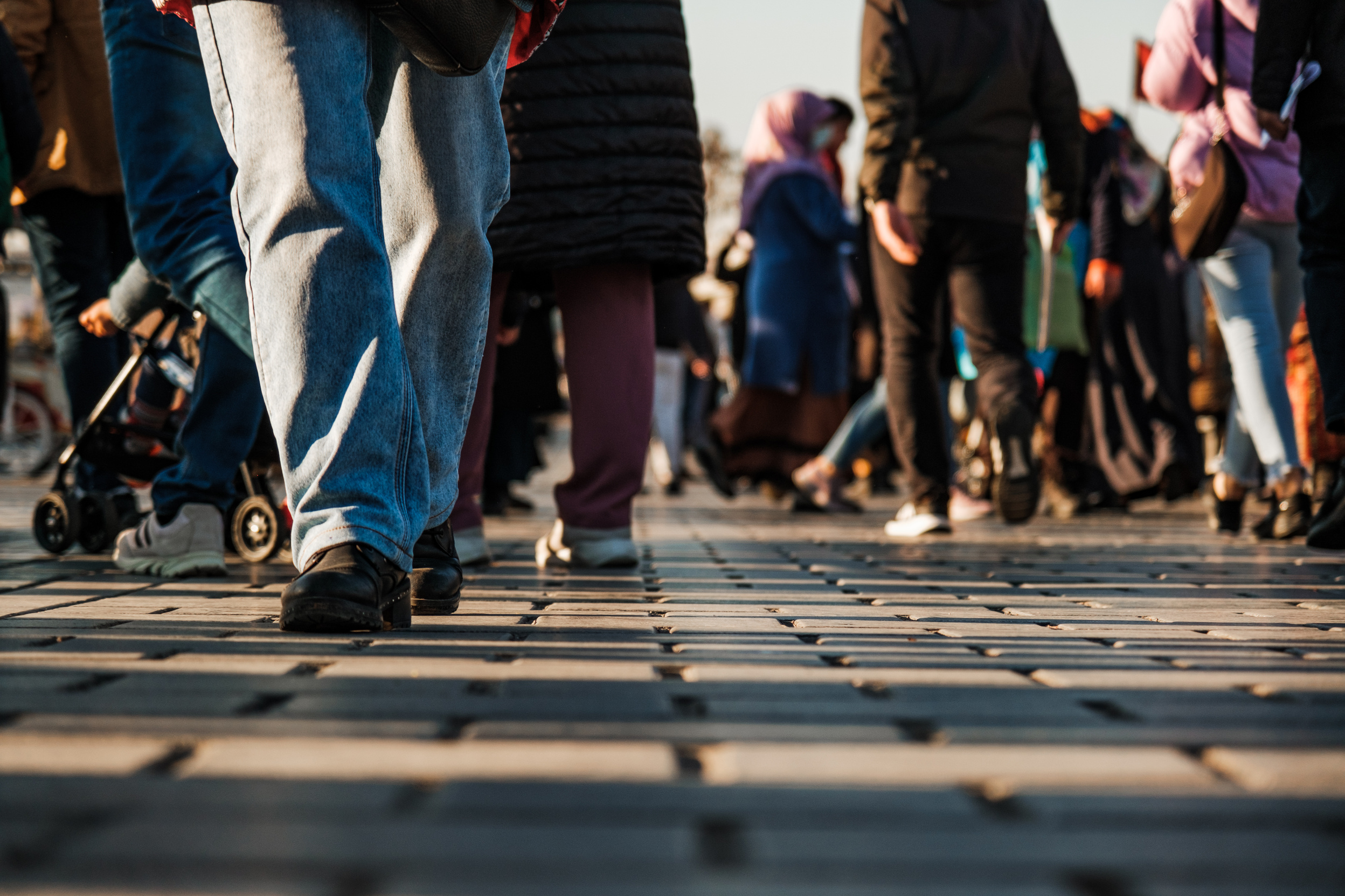 People Walking in the Busy Street