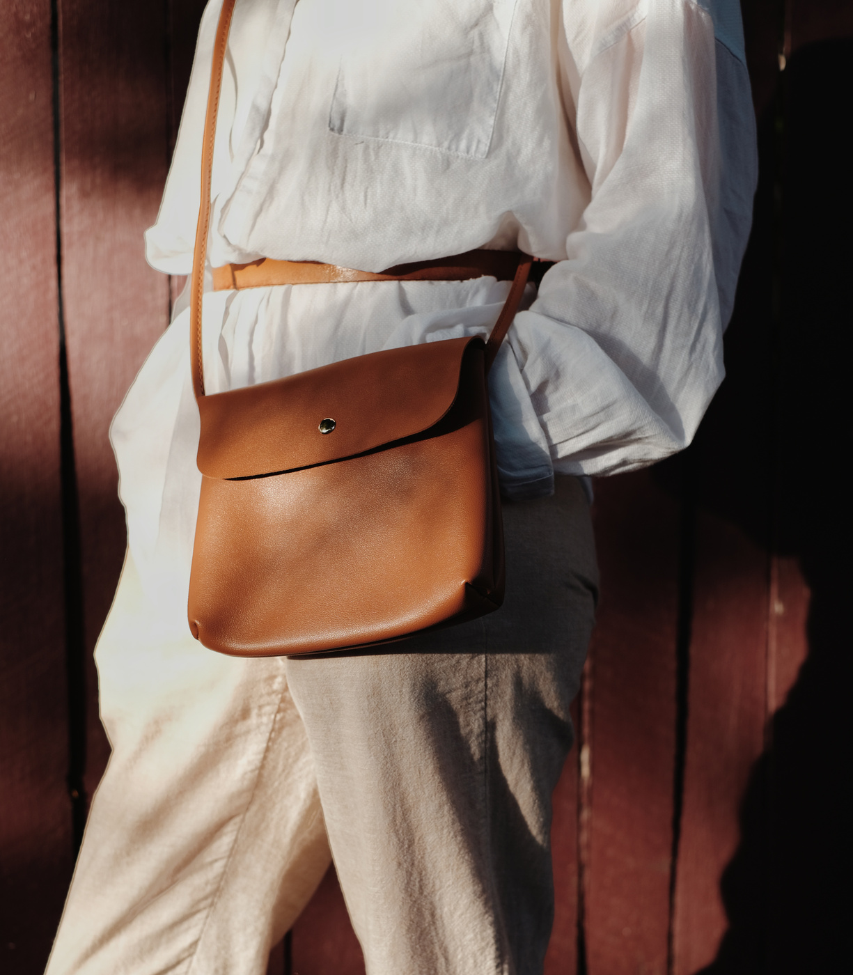 Woman using crossbody bag